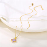Purple Crystal & Goldtone Quatrefoil Pendant Necklace