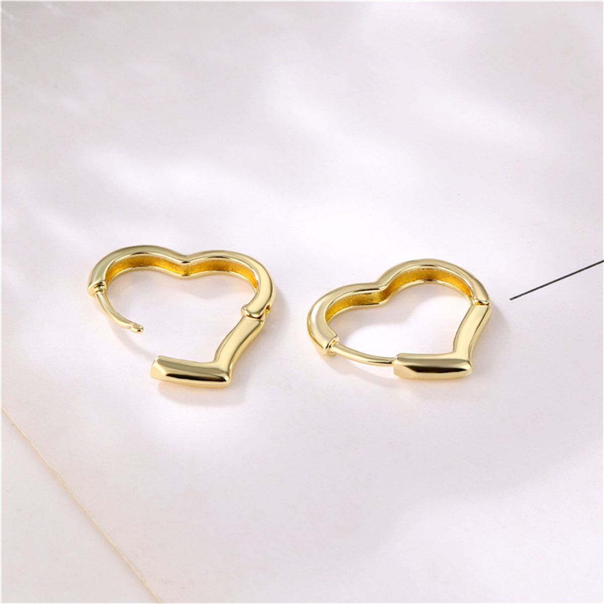 18K Gold-Plated Open Heart Huggie Earrings, gold huggie earrings, vintage-inspired design, side view