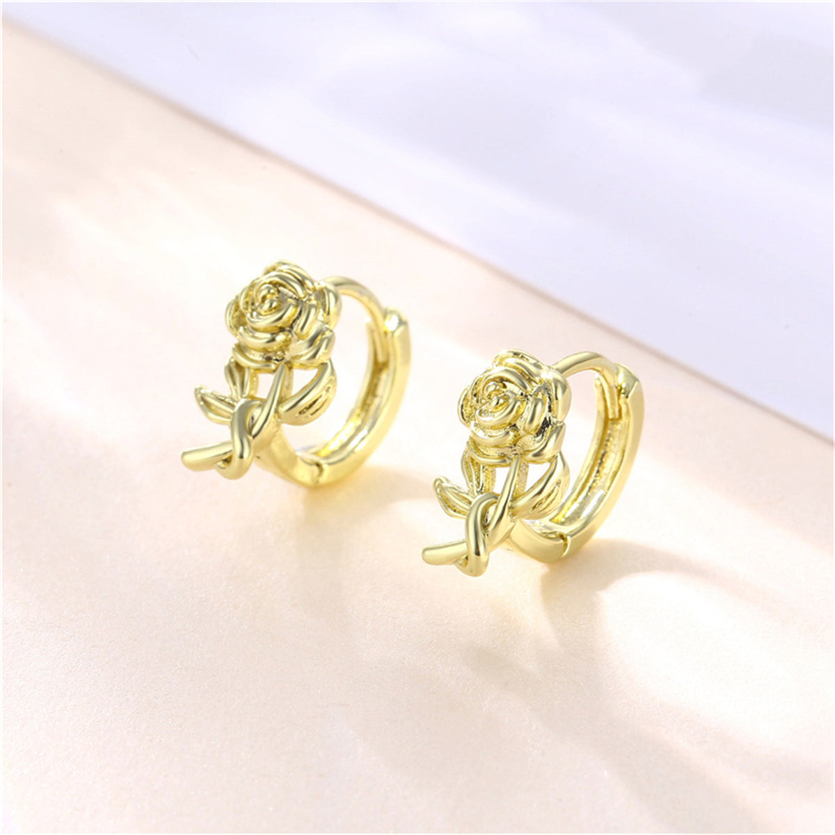 18K Gold-Plated Rose Huggie Earrings, gold huggie earrings, dainty minimalist design, side view