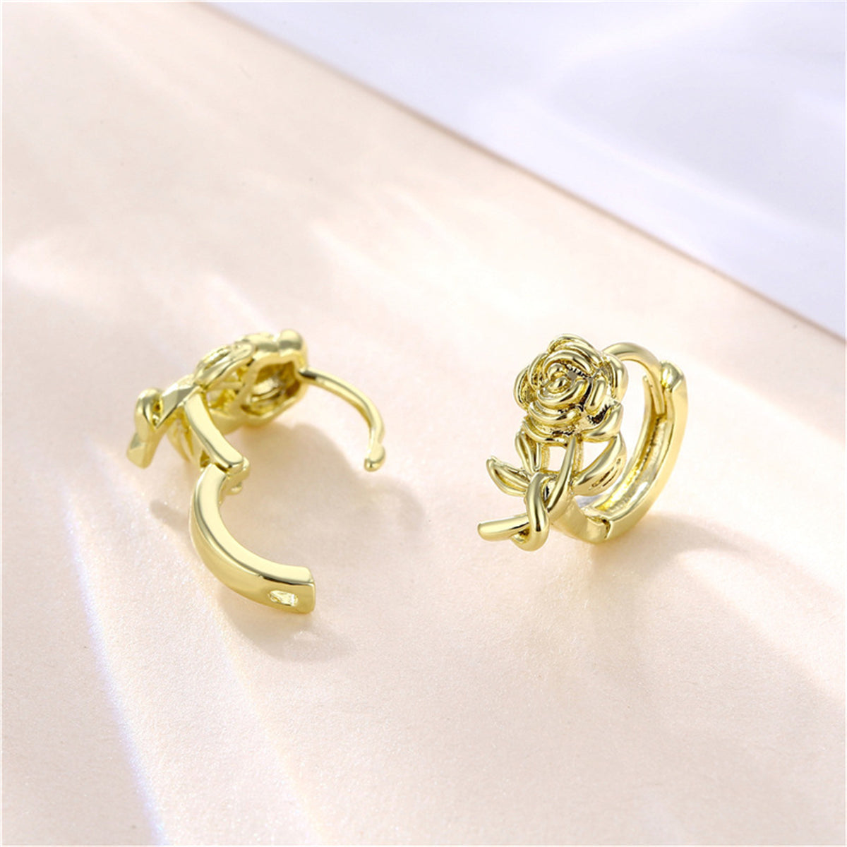 18K Gold-Plated Rose Huggie Earrings, gold huggie earrings, dainty minimalist design, detail close-up