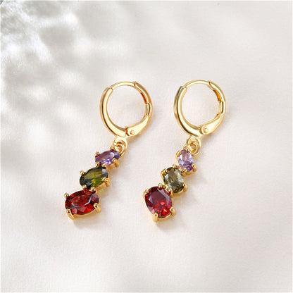 Crystal and 18K Gold-Plated Oval-Cut Huggie Earrings, gold huggie earrings, everyday style, side view