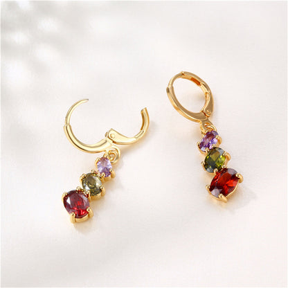 Crystal and 18K Gold-Plated Oval-Cut Huggie Earrings, gold huggie earrings, everyday style, detail close-up