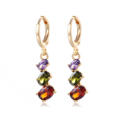 Crystal and 18K Gold-Plated Oval-Cut Huggie Earrings, gold huggie earrings, everyday style, styled look