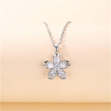 Crystal & Silvertone Floral Pendant Necklace