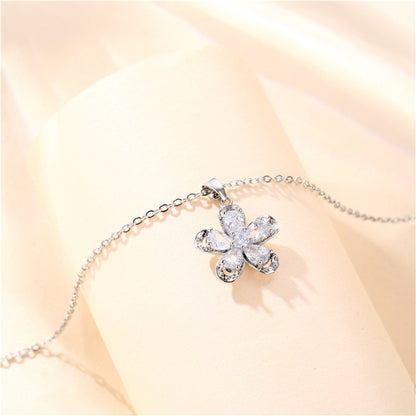 Crystal and Silver-Plated Floral Pendant Necklace, silver pendant necklace for women, vintage-inspired design, lifestyle look