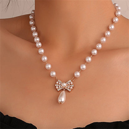 Pearl and Cubic Zirconia 18K Gold-Plated Bow Pendant Necklace, gold pendant necklace for women, front view