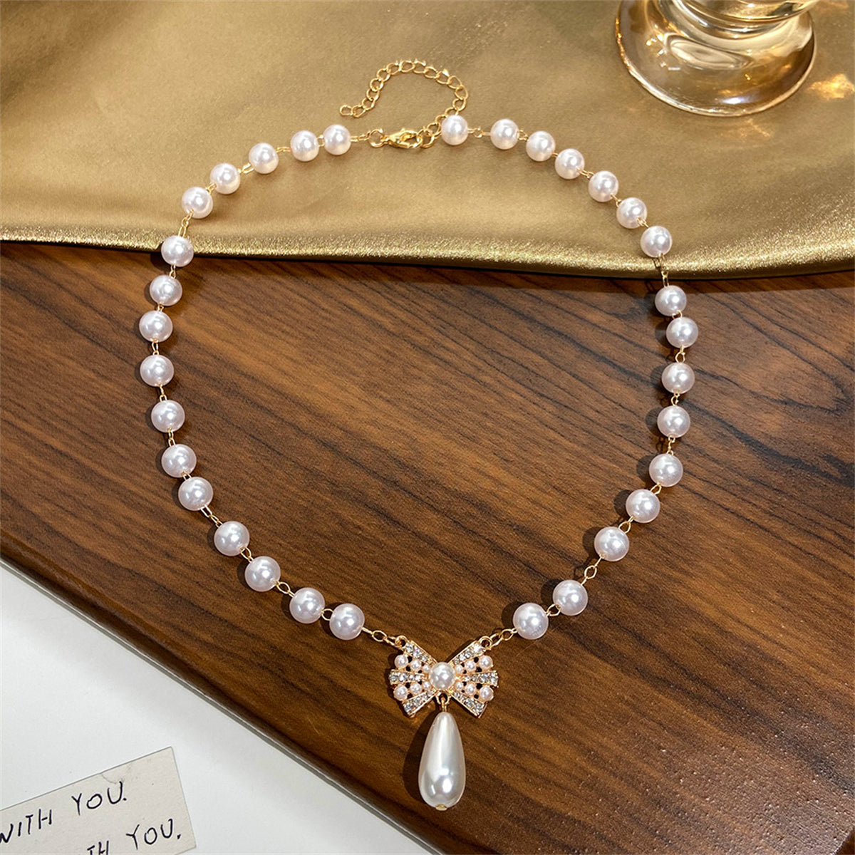 Pearl and Cubic Zirconia 18K Gold-Plated Bow Pendant Necklace, gold pendant necklace for women, lifestyle look