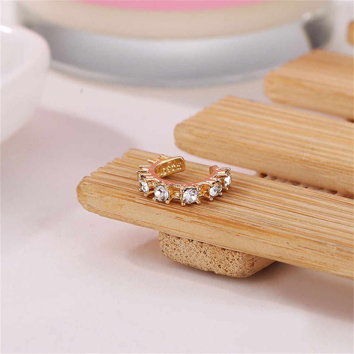 Cubic Zirconia and 18K Gold-Plated Ear Cuff, gold stud earrings for women, botanical inspired, detail close-up