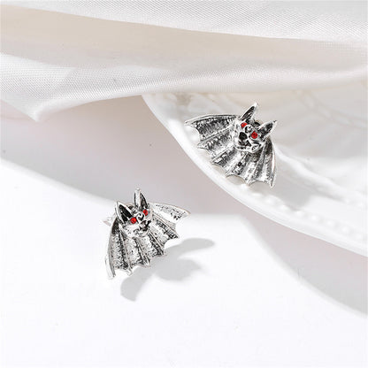 Red Cubic Zirconia and Silver-Plated Bat Stud Earrings, silver stud earrings for women, detail close-up