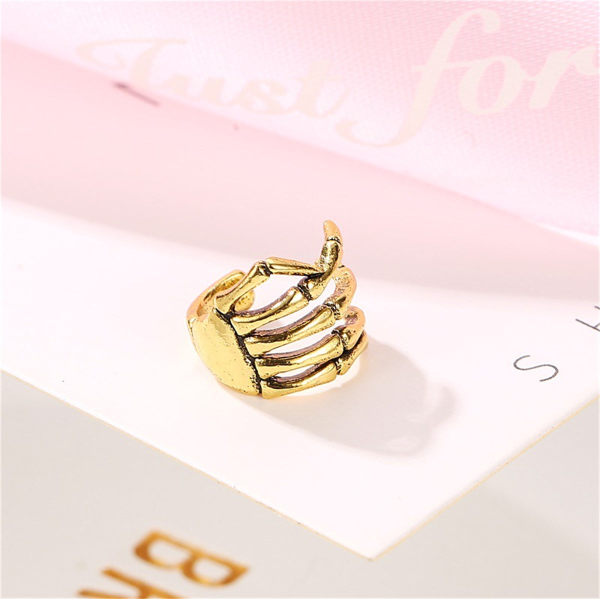 18K Gold-Plated Skeleton Hand Ear Cuff, gold stud earrings for women, vintage-inspired design, detail close-up