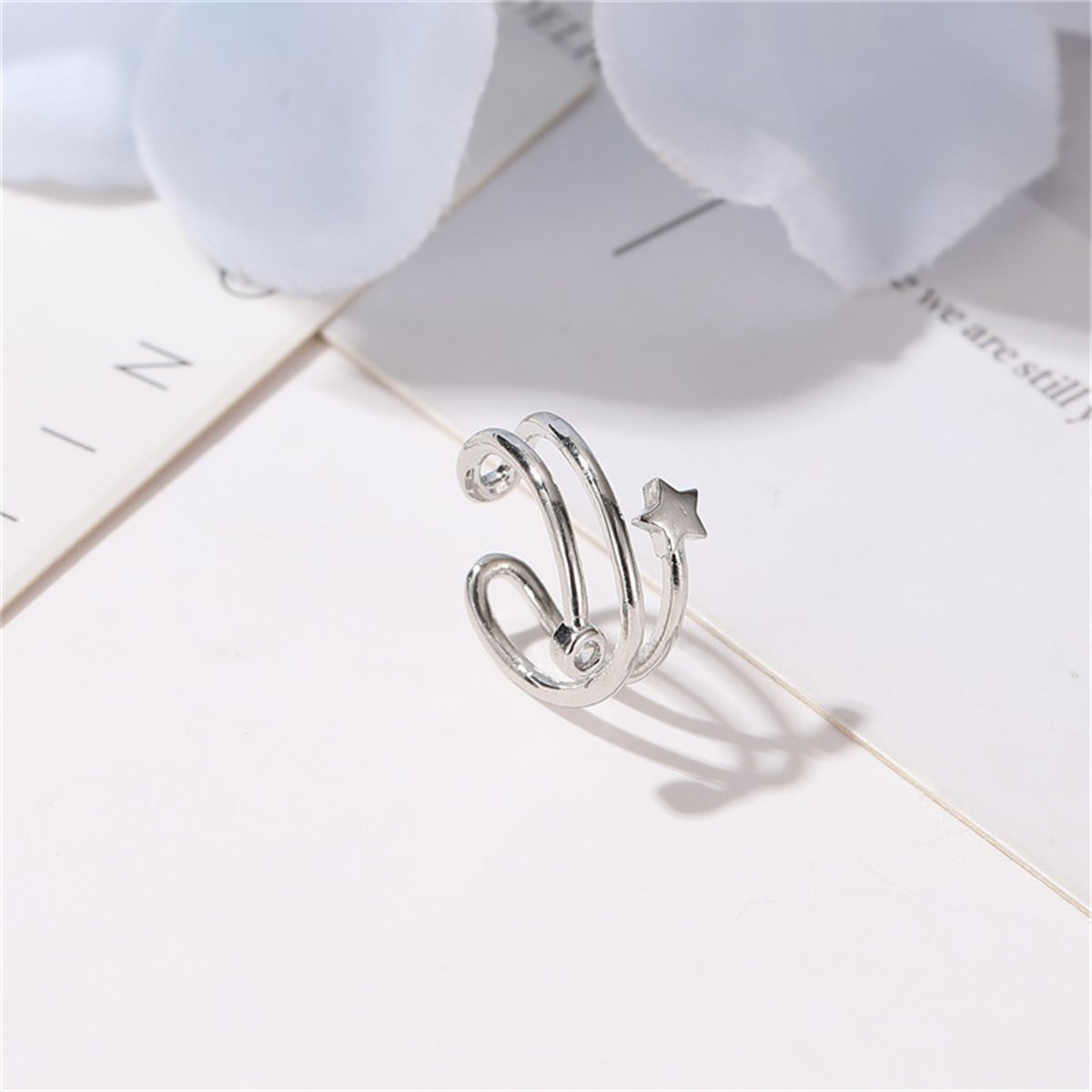Clear Cubic Zirconia and Silver-Plated Star Layered Ear Cuff, silver stud earrings for women, botanical inspired, front view