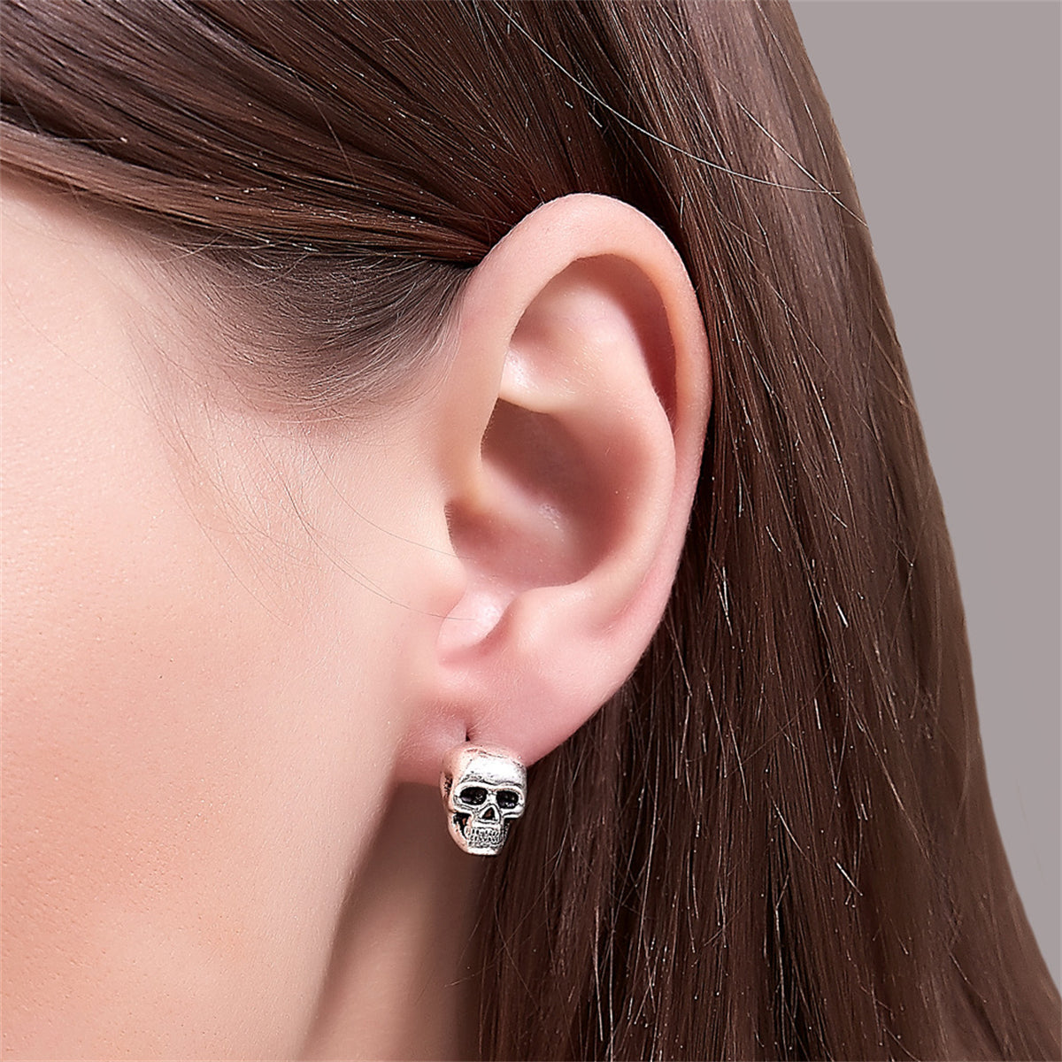 Silver-Plated Skull Stud Earrings, silver stud earrings for women, botanical inspired, side view