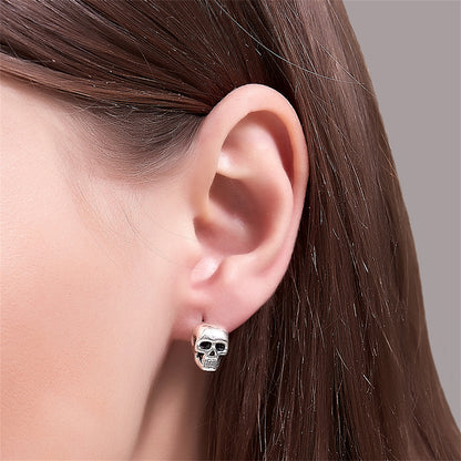 Silver-Plated Skull Stud Earrings, silver stud earrings for women, botanical inspired, side view