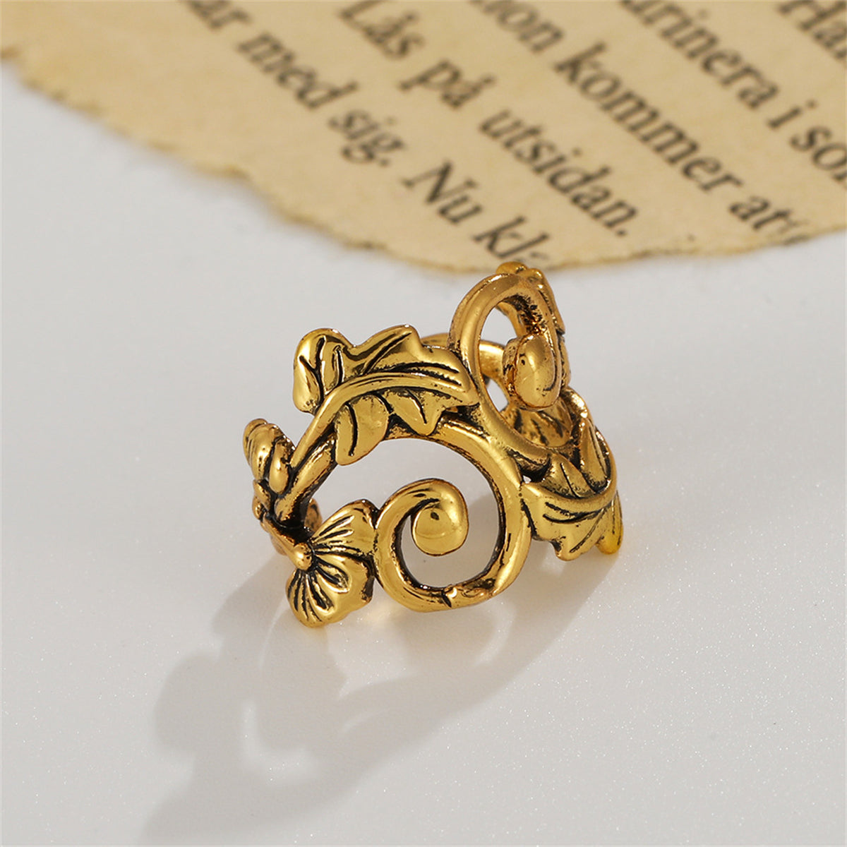 18K Gold-Plated Leaf Swirl Ear Cuff, gold stud earrings for women, everyday style, detail close-up