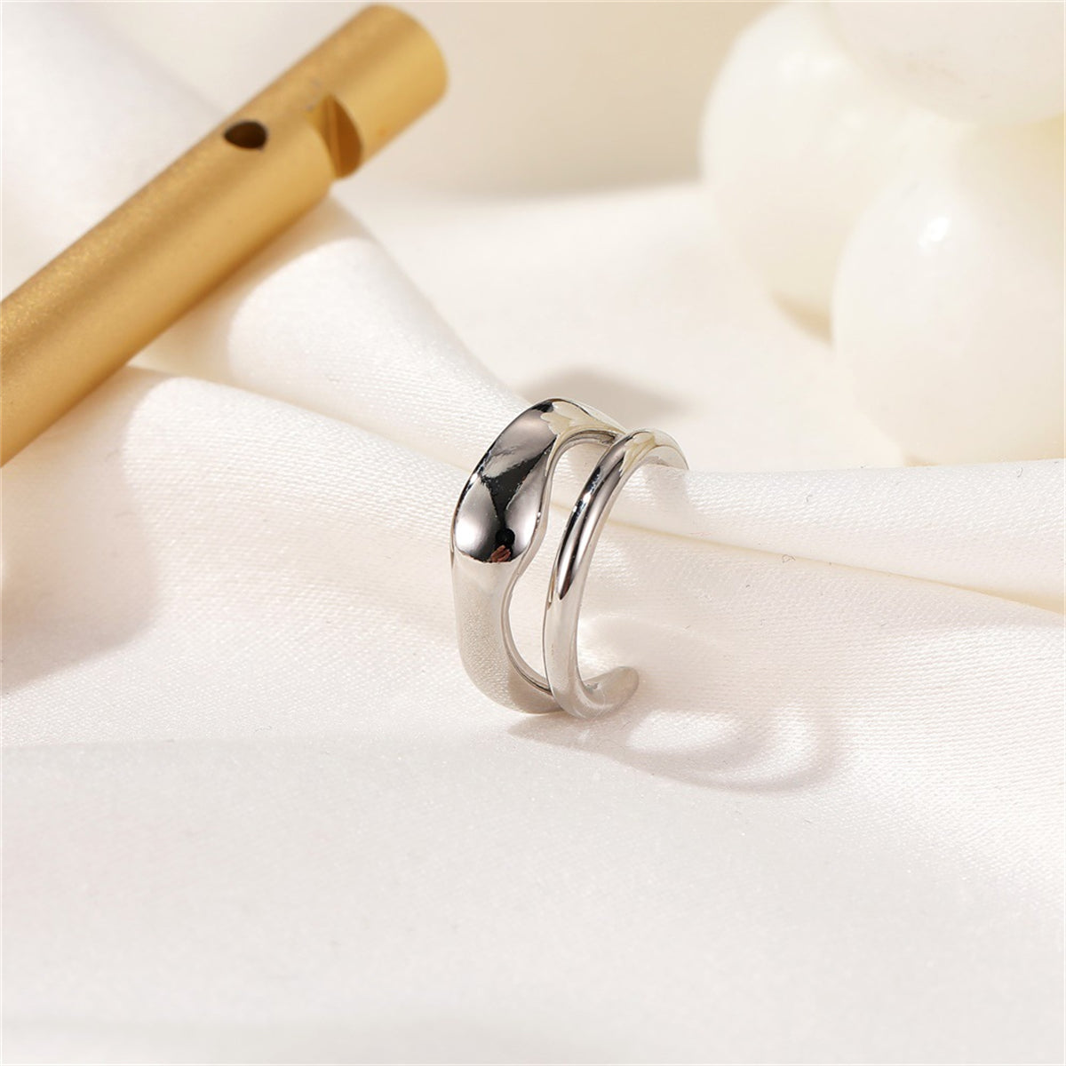 Silver-Plated Abstract Layered Ear Cuff, silver stud earrings for women, dainty minimalist design, front view