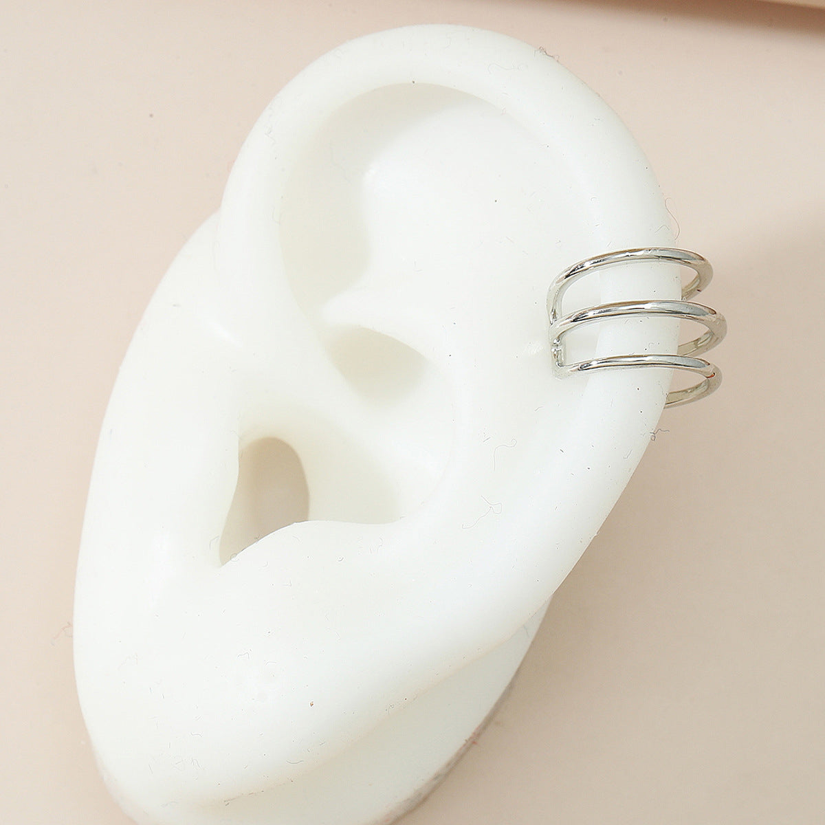 Silver-Plated Layered Ear Cuff, silver stud earrings for women, botanical inspired, front view
