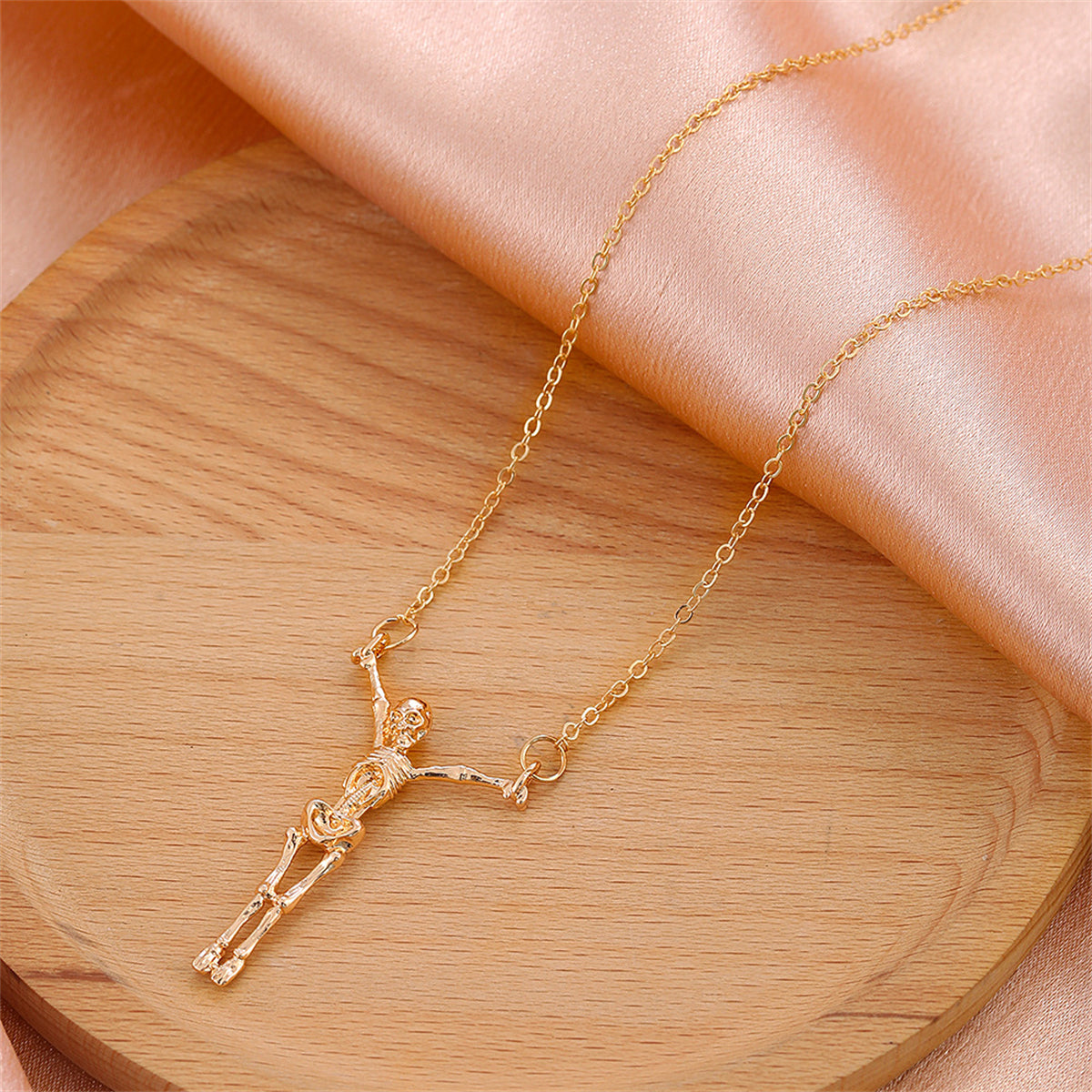 18K Gold-Plated Hanging Skeleton Pendant Necklace, gold pendant necklace for women, dainty minimalist design, side view