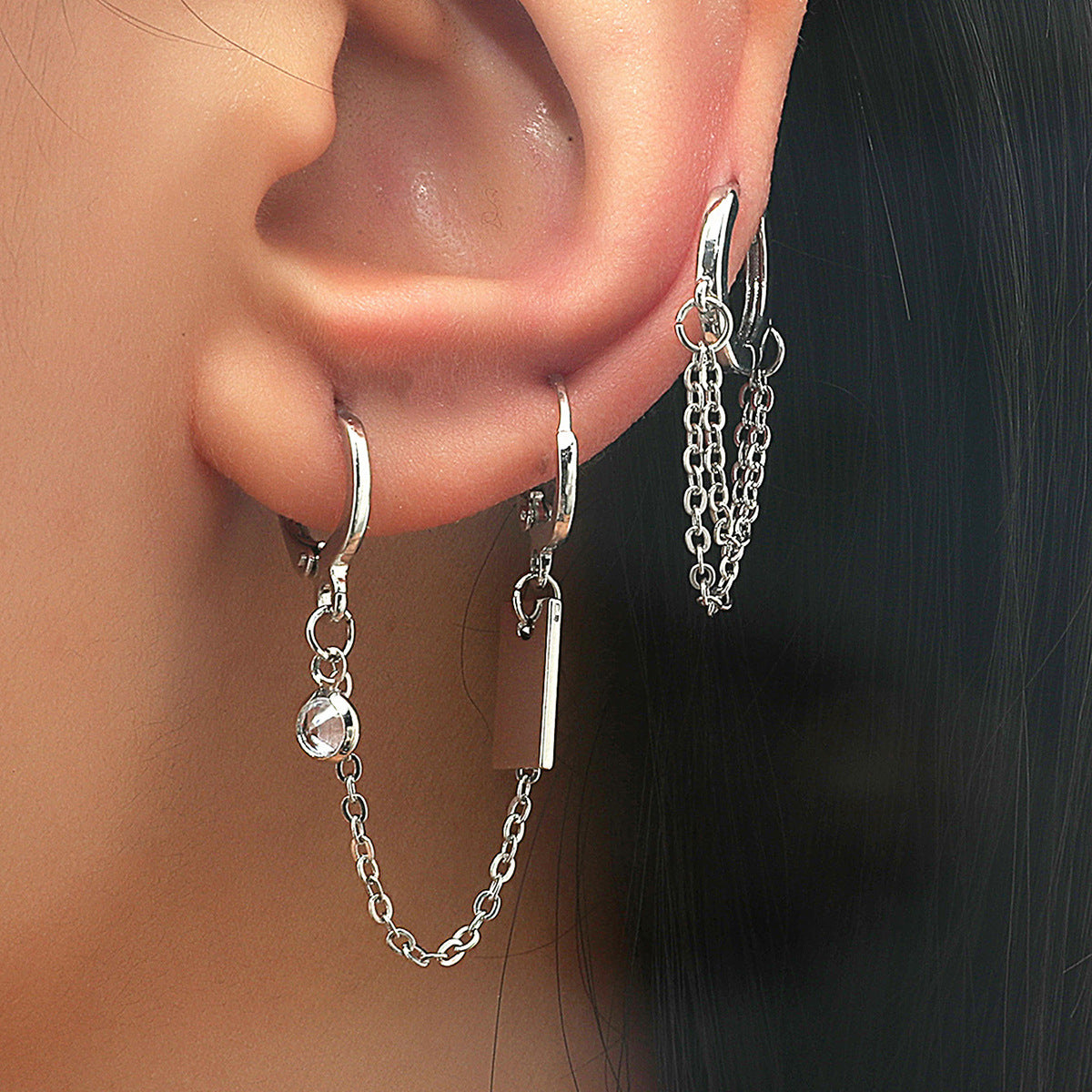 Cubic Zirconia and Silver-Plated Chain Huggie Earrings, silver huggie earrings, dainty minimalist design, front view