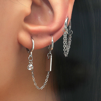 Cubic Zirconia and Silver-Plated Chain Huggie Earrings, silver huggie earrings, dainty minimalist design, front view