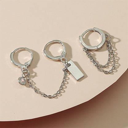 Cubic Zirconia and Silver-Plated Chain Huggie Earrings, silver huggie earrings, dainty minimalist design, detail close-up