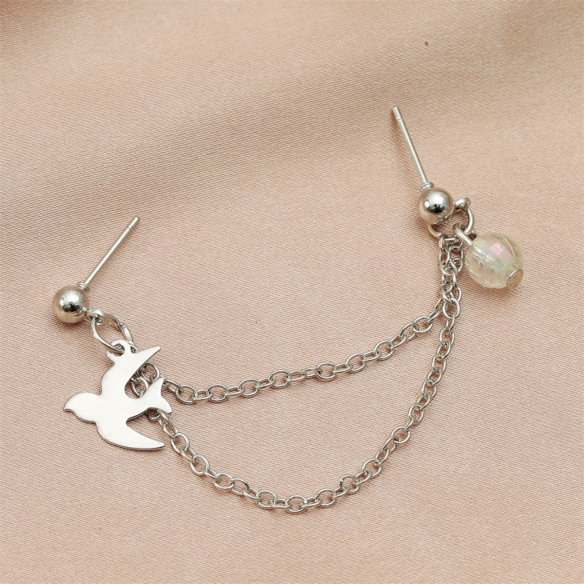 Acrylic and Silver-Plated Swallow Chain Ear Cuff, silver drop earrings for women, vintage-inspired design, lifestyle look