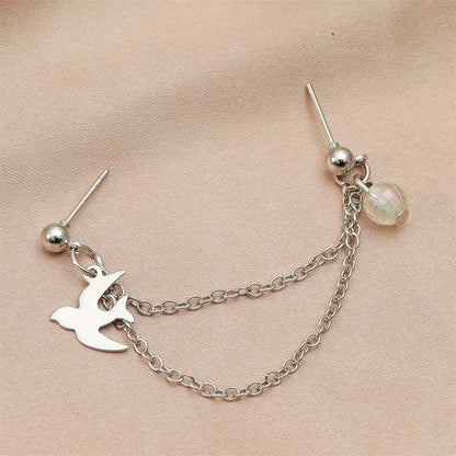 Acrylic and Silver-Plated Swallow Chain Ear Cuff, silver drop earrings for women, vintage-inspired design, lifestyle look