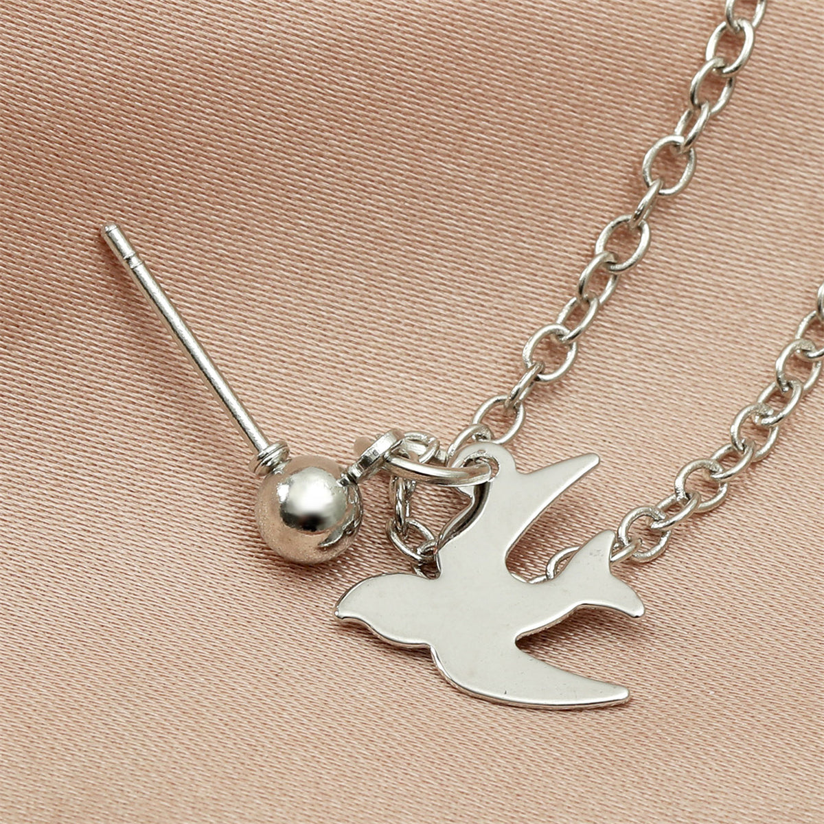 Acrylic and Silver-Plated Swallow Chain Ear Cuff, silver drop earrings for women, vintage-inspired design, detail close-up