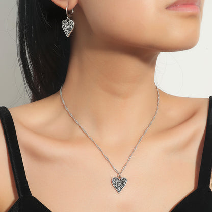 Silver-Plated Filigree Heart Huggie Earrings and Pendant Necklace, silver huggie earrings, everyday style, front view