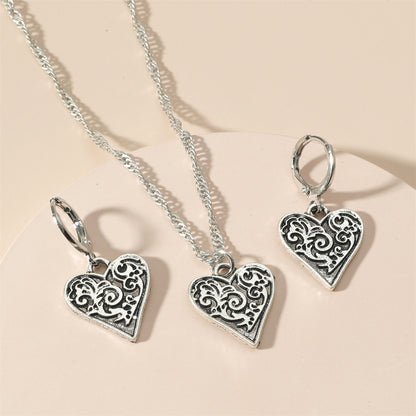 Silver-Plated Filigree Heart Huggie Earrings and Pendant Necklace, silver huggie earrings, everyday style, lifestyle look