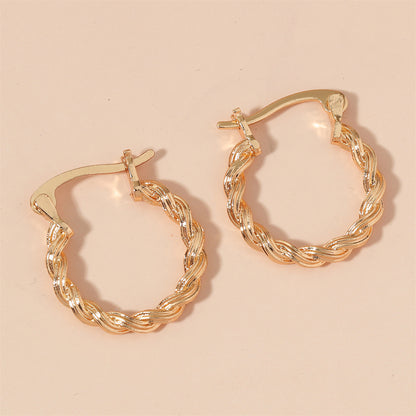 18K Gold-Plated Twisted Huggie Earrings, gold huggie earrings, dainty minimalist design, front view