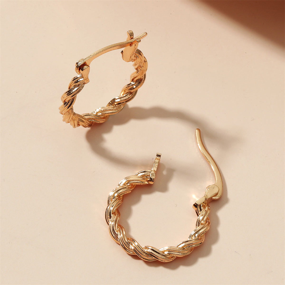 18K Gold-Plated Twisted Huggie Earrings, gold huggie earrings, dainty minimalist design, side view