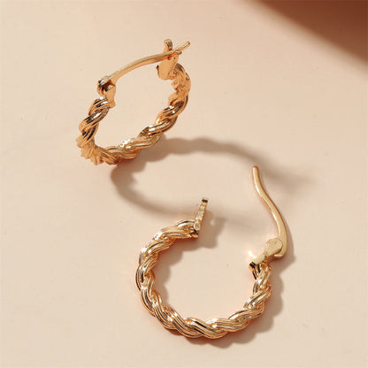 18K Gold-Plated Twisted Huggie Earrings, gold huggie earrings, dainty minimalist design, side view