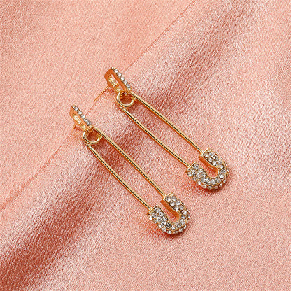 Cubic Zirconia and 18K Gold-Plated Pin Drop Earrings, gold drop earrings for women, dainty minimalist design, lifestyle look