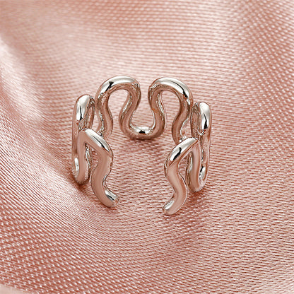 Silver-Plated Snake Ear Cuff, silver stud earrings for women, dainty minimalist design, detail close-up