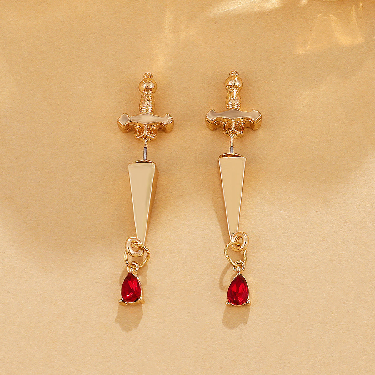 Red Crystal and 18K Gold-Plated Sword Ear Jackets, gold drop earrings for women, botanical inspired, lifestyle look
