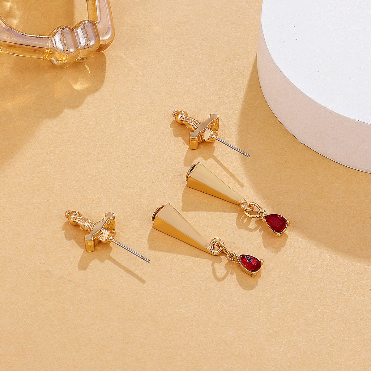 Red Crystal and 18K Gold-Plated Sword Ear Jackets, gold drop earrings for women, botanical inspired, side view