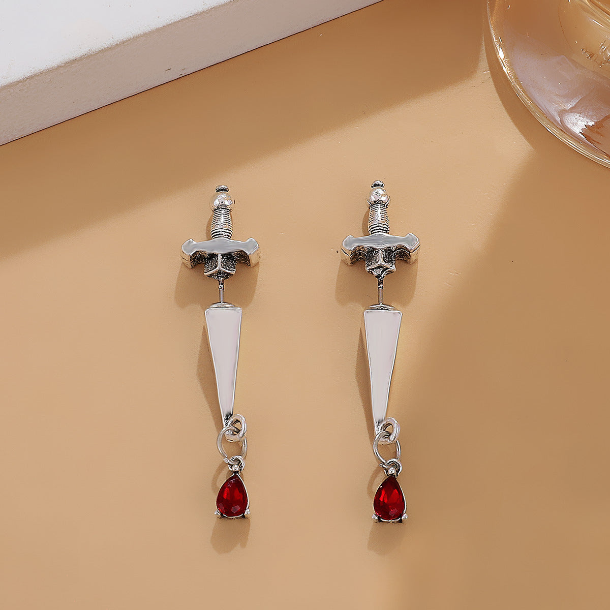 Red Crystal and Silver-Plated Sword Ear Jackets, silver drop earrings for women, botanical inspired, side view