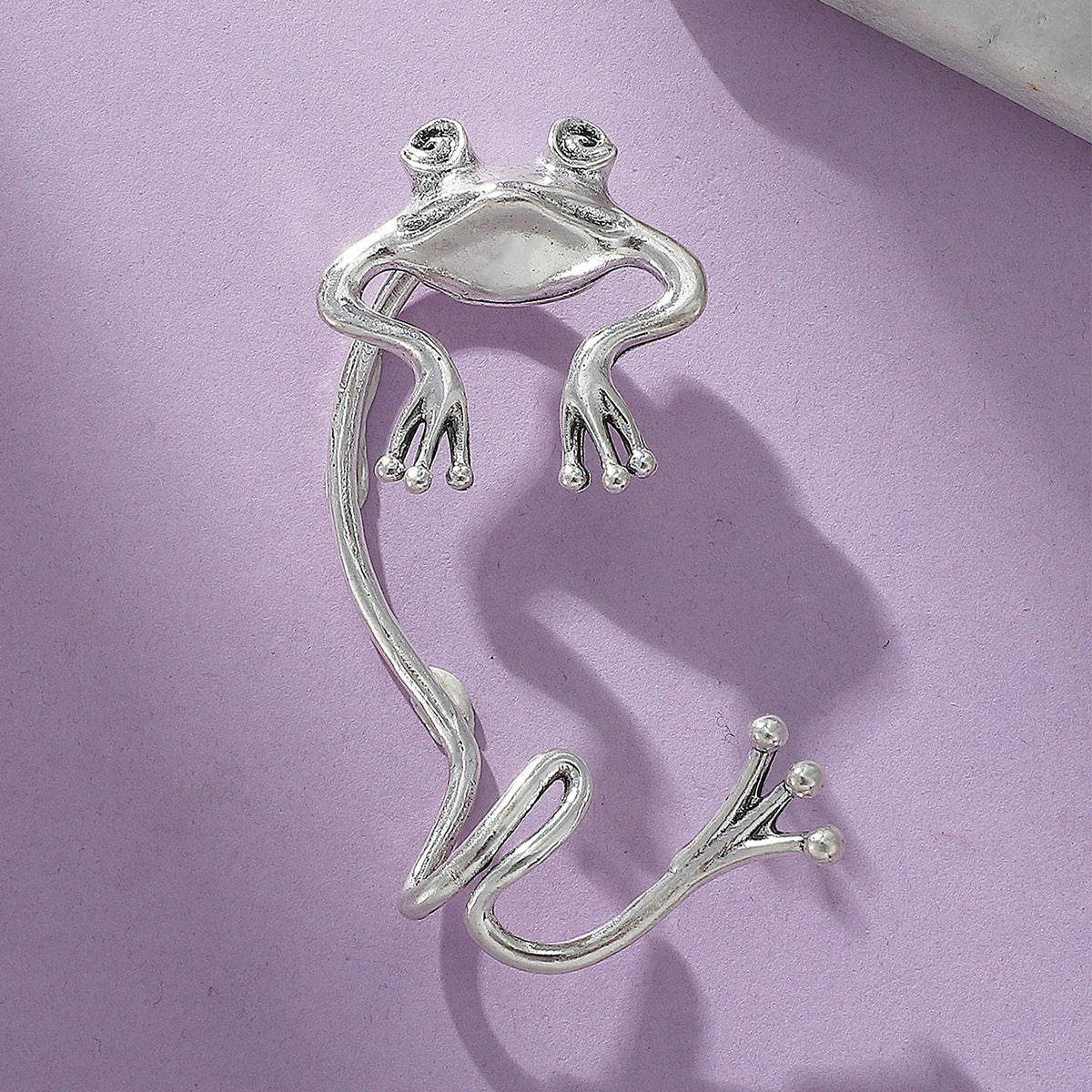 Silver-Plated Frog Ear Cuff, silver stud earrings for women, elegant gift for her, detail close-up