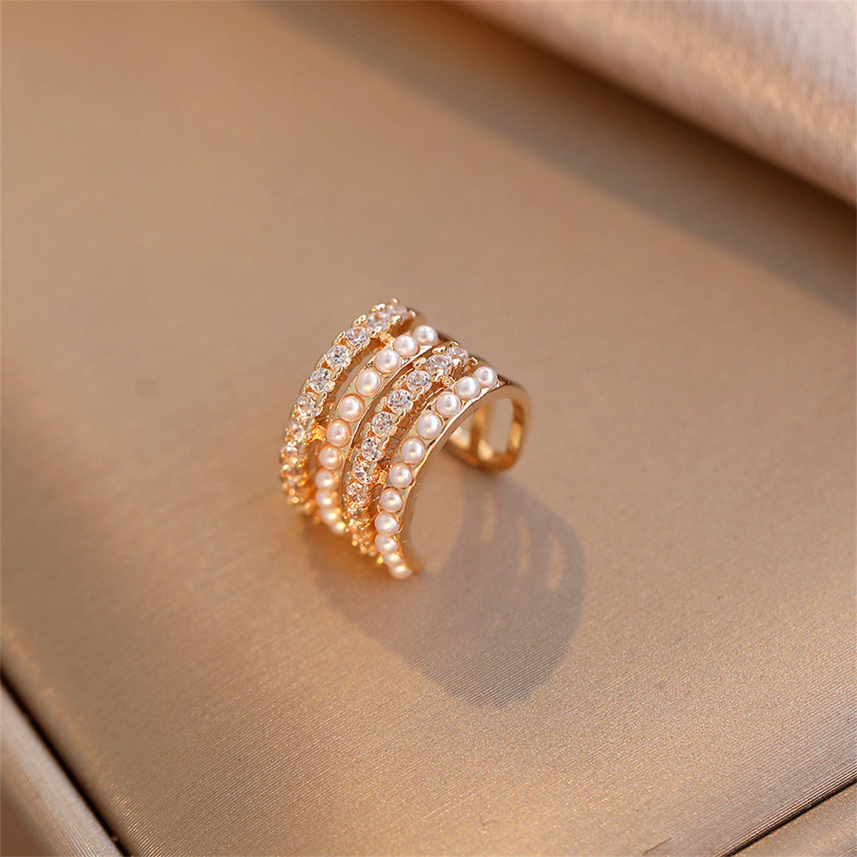 Cubic Zirconia and Pearl 18K Gold-Plated Layered Ear Cuff, gold stud earrings for women, botanical inspired, detail close-up