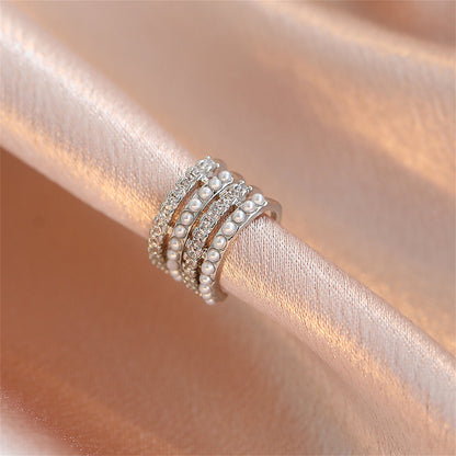 Clear Cubic Zirconia and Pearl Silver-Plated Layered Ear Cuff, silver stud earrings for women, botanical inspired, front view