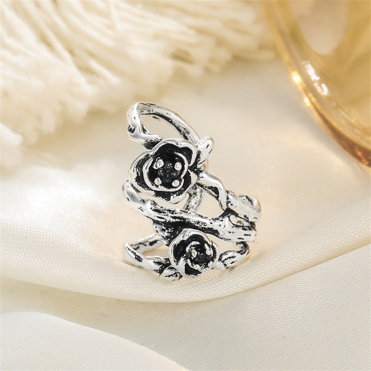 Black and Silver-Plated Rose Layered Ear Cuff, silver stud earrings for women, botanical inspired, lifestyle look