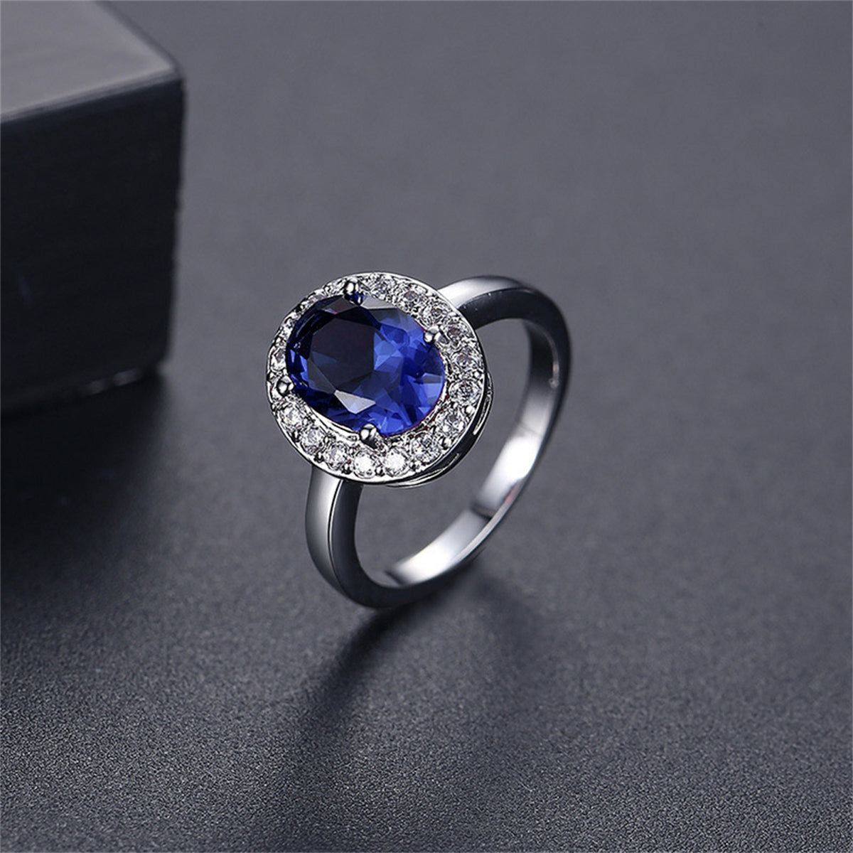 Blue Crystal and Cubic Zirconia Silver-Plated Halo Oval Ring, silver statement rings for women, front view