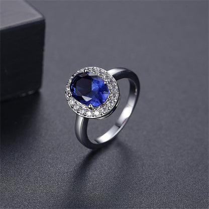 Blue Crystal and Cubic Zirconia Silver-Plated Halo Oval Ring, silver statement rings for women, front view