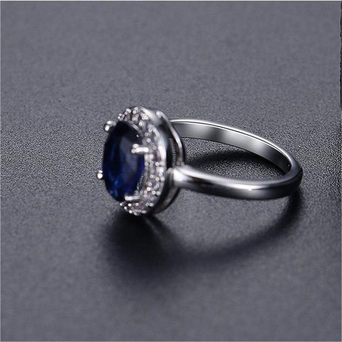 Blue Crystal and Cubic Zirconia Silver-Plated Halo Oval Ring, silver statement rings for women, botanical inspired, side view