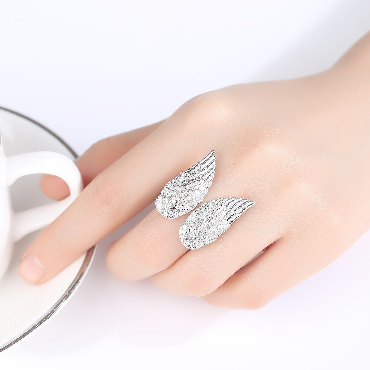 Cubic Zirconia and Silver-Plated Wings Open Ring, silver statement rings for women, botanical inspired, lifestyle look
