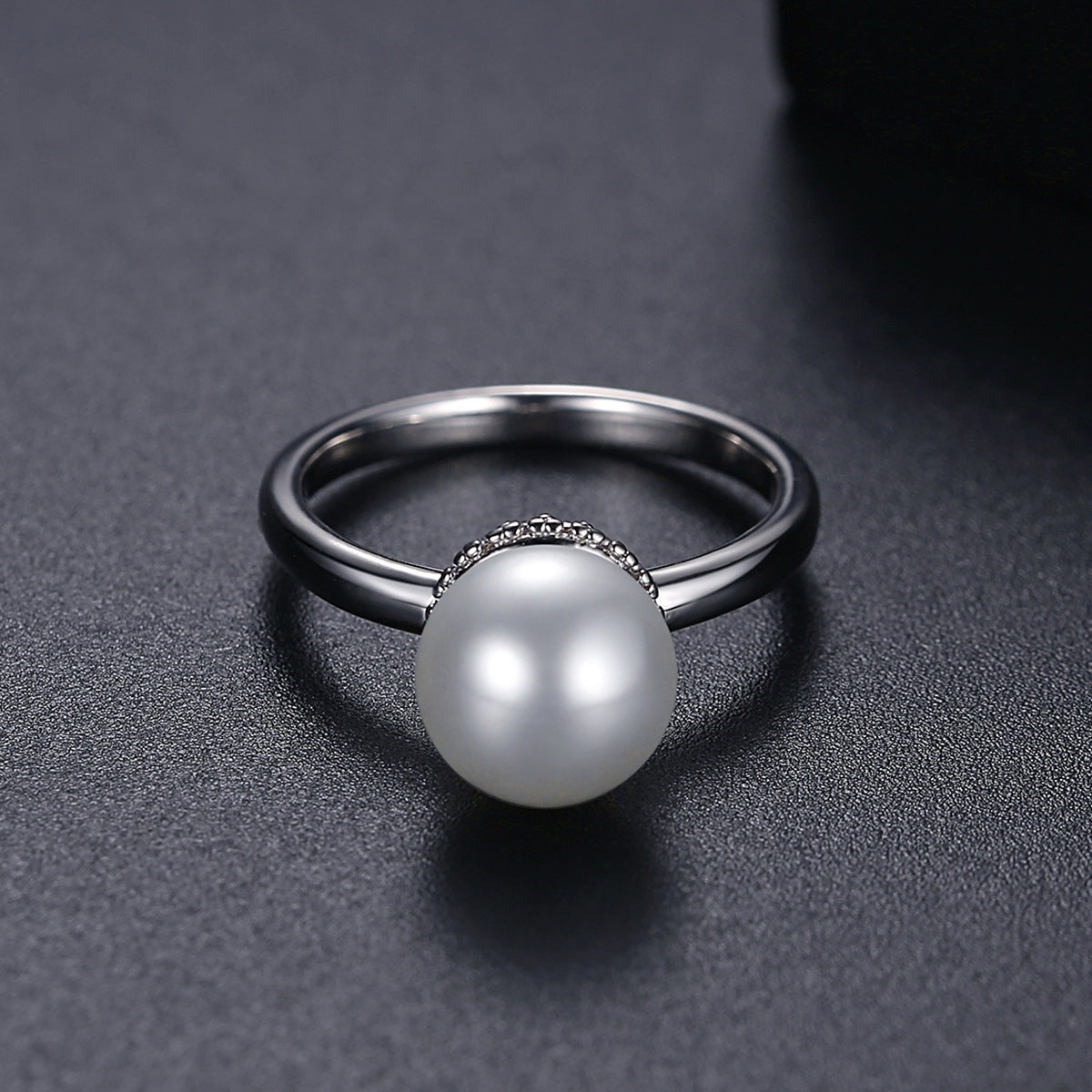 Pearl and Silver-Plated Ball Ring, silver statement rings for women, dainty minimalist design, detail close-up