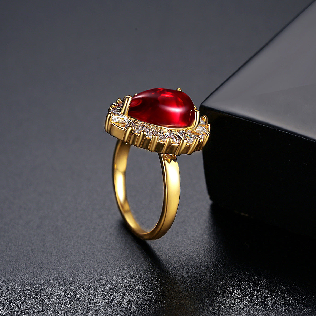 Red Crystal and 18K Gold-Plated Pear-Cut Ring, gold statement rings for women, vintage-inspired design, detail close-up