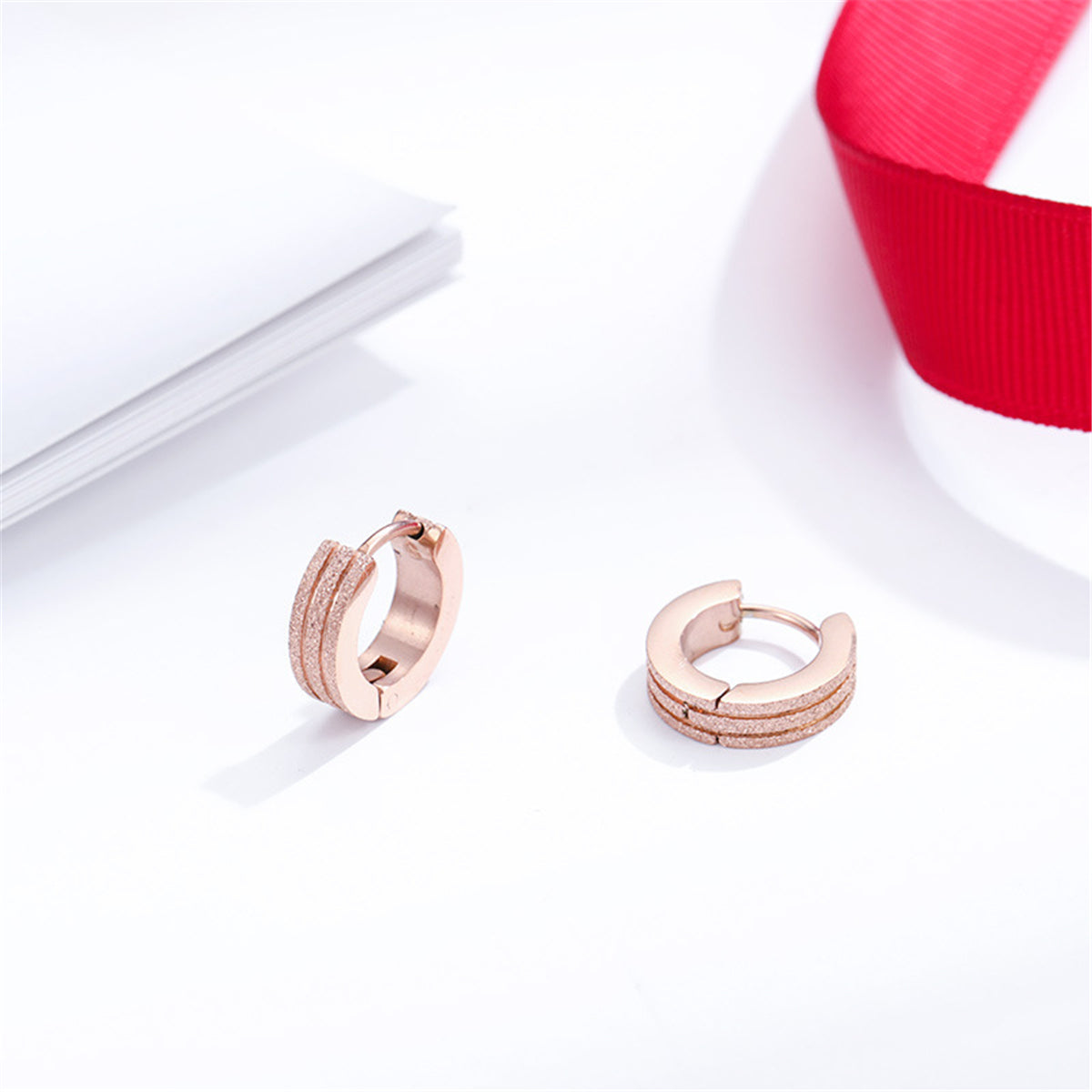 18K Rose Gold-Plated Frosted Huggie Earring, rose gold huggie earrings, dainty minimalist design, lifestyle look