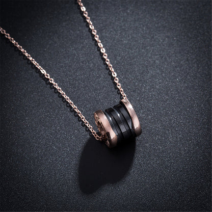 Black Ceramic and 18K Rose Gold-Plated Coil Pendant Necklace, rose gold pendant necklace for women, side view