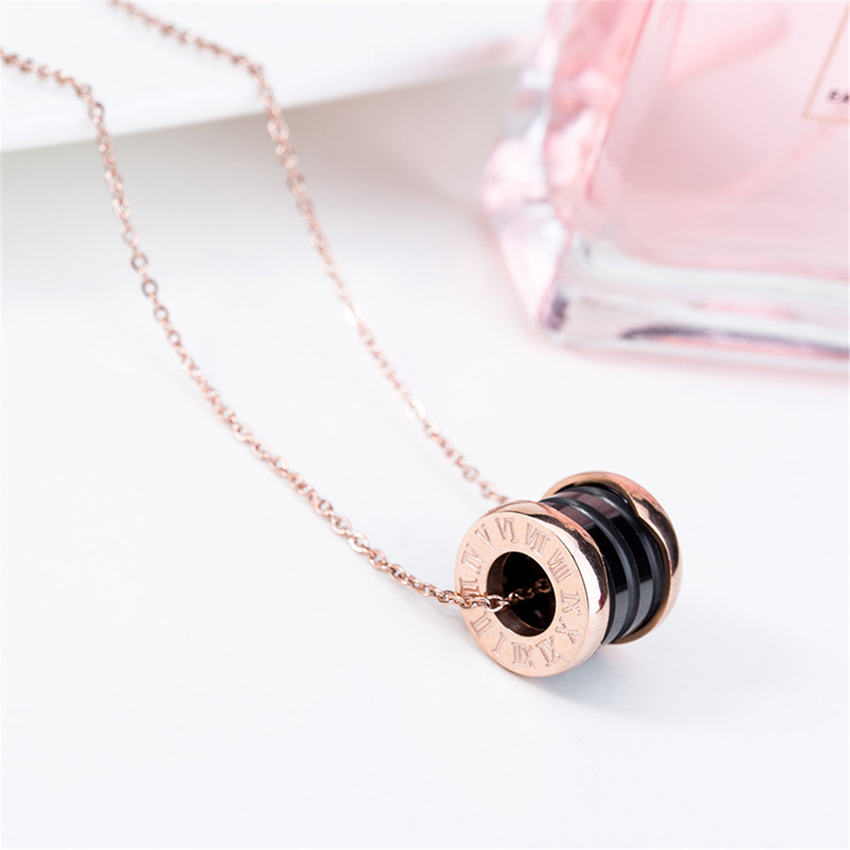 Black Ceramic and 18K Rose Gold-Plated Coil Pendant Necklace, rose gold pendant necklace for women, detail close-up